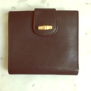 Black Longchamp wallet.
